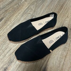 Black Tom’s. Slide ons. Size 5